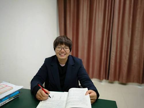 梁美东